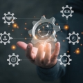 Business process management and workflow automation diagram with gears and icons with connection line network in background. Manager touching interface